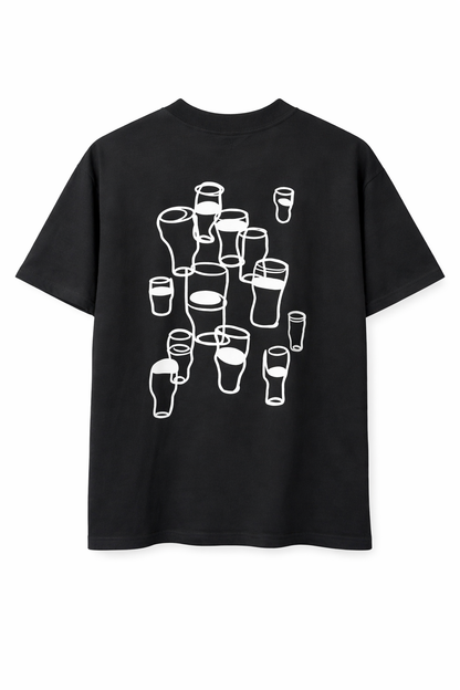 A pint of plain Black Tee